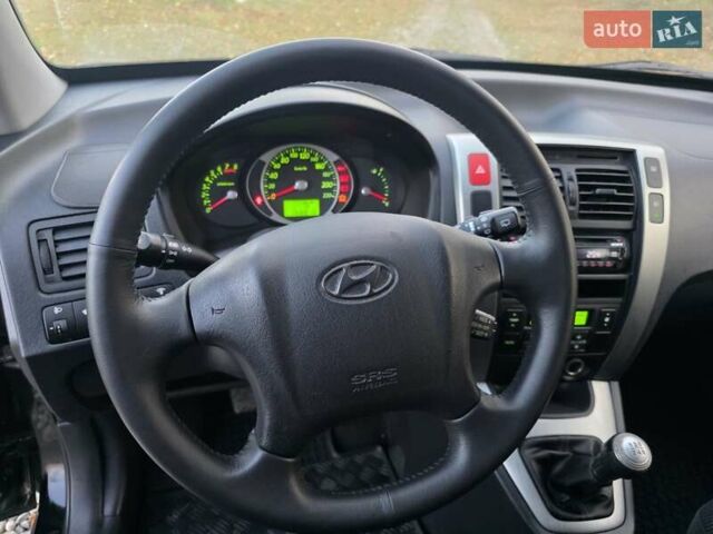 Хендай Туксон 2009 в Гусятине на Automoto.ua Черный Хендай Туксон, объемом двигателя 2 л и пробегом 143 тыс. км за 9700 $, фото 46 на Automoto.ua