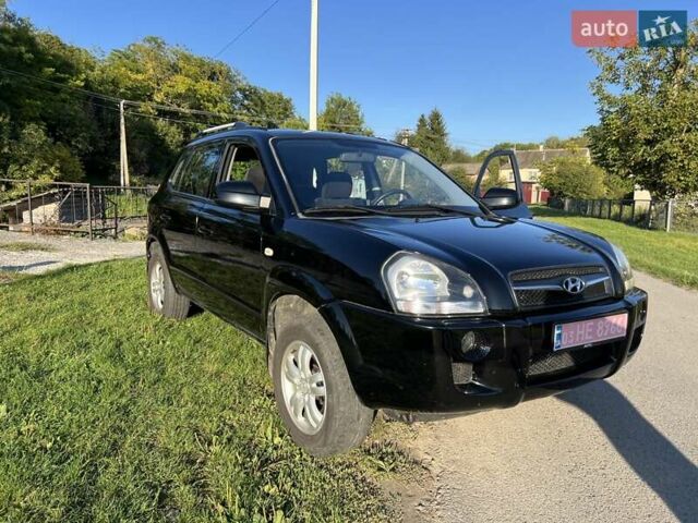 Черный Хендай Туксон, объемом двигателя 2 л и пробегом 199 тыс. км за 8300 $, фото 9 на Automoto.ua
