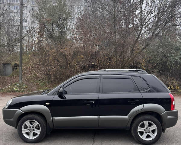 Чорний Хендай Туксон, об'ємом двигуна 2 л та пробігом 120 тис. км за 9000 $, фото 7 на Automoto.ua