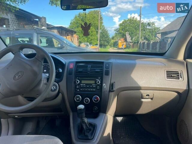 Чорний Хендай Туксон, об'ємом двигуна 2 л та пробігом 187 тис. км за 7900 $, фото 11 на Automoto.ua