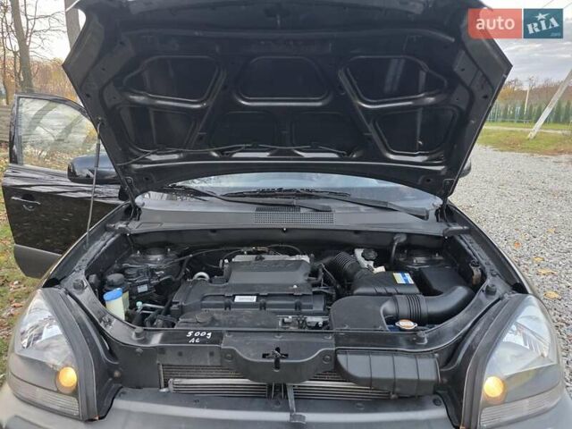 Хендай Туксон 2009 в Гусятине на Automoto.ua Черный Хендай Туксон, объемом двигателя 2 л и пробегом 143 тыс. км за 9700 $, фото 59 на Automoto.ua