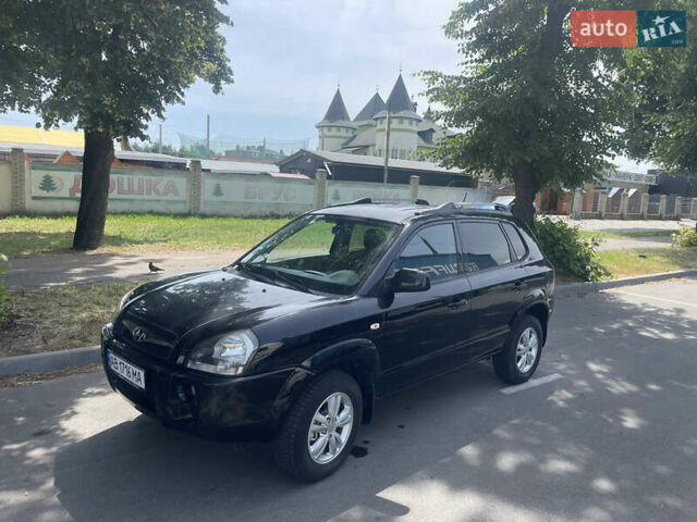 Черный Хендай Туксон, объемом двигателя 1.98 л и пробегом 182 тыс. км за 7999 $, фото 3 на Automoto.ua