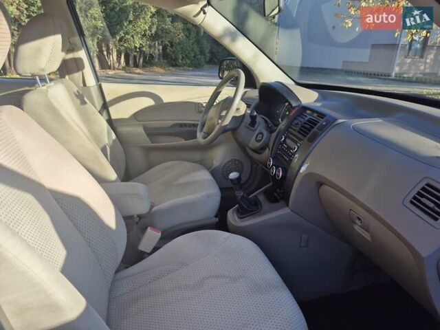 Чорний Хендай Туксон, об'ємом двигуна 2 л та пробігом 187 тис. км за 7900 $, фото 7 на Automoto.ua