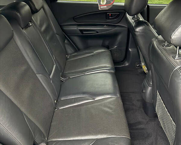 Черный Хендай Туксон, объемом двигателя 2.66 л и пробегом 205 тыс. км за 10000 $, фото 64 на Automoto.ua