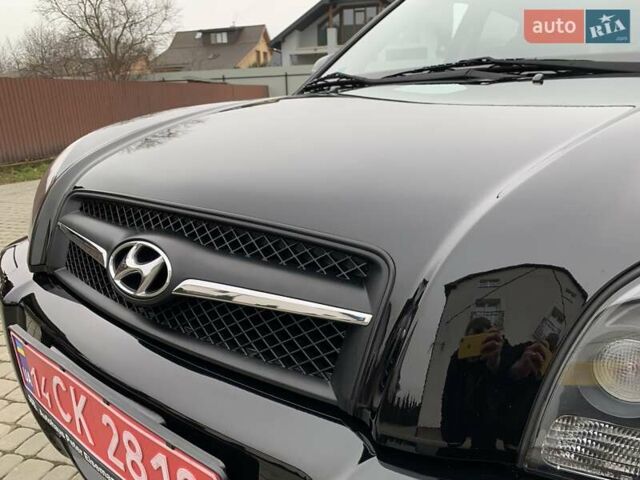 Черный Хендай Туксон, объемом двигателя 2 л и пробегом 114 тыс. км за 8850 $, фото 14 на Automoto.ua