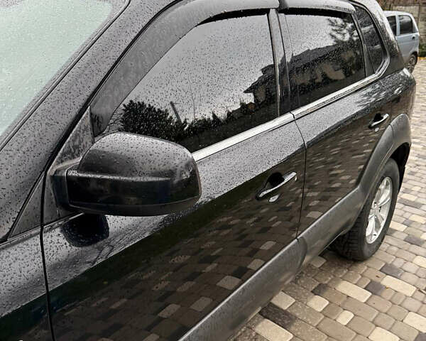 Черный Хендай Туксон, объемом двигателя 2.66 л и пробегом 205 тыс. км за 10000 $, фото 44 на Automoto.ua