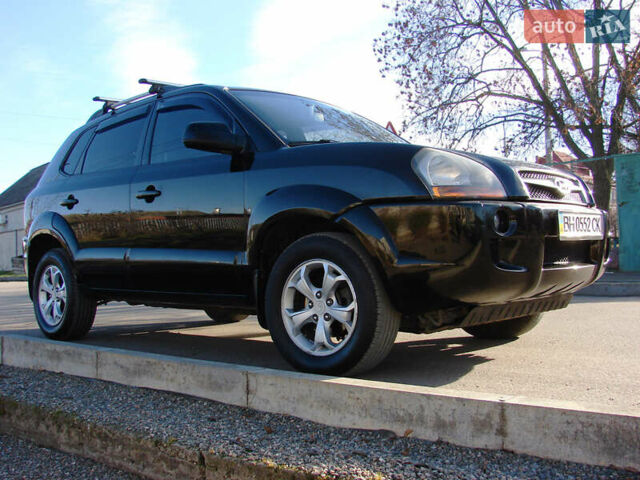 Черный Хендай Туксон, объемом двигателя 2 л и пробегом 162 тыс. км за 8200 $, фото 10 на Automoto.ua