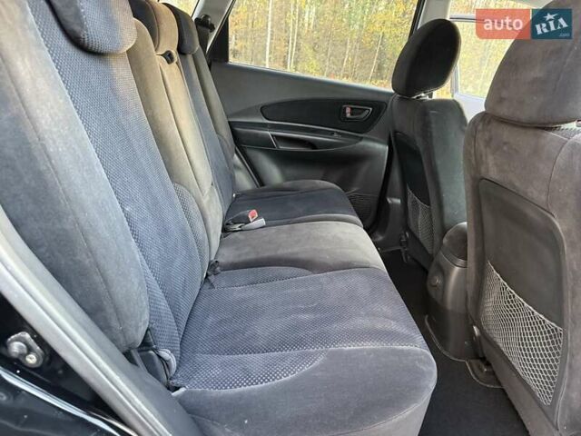 Черный Хендай Туксон, объемом двигателя 2 л и пробегом 148 тыс. км за 8700 $, фото 20 на Automoto.ua