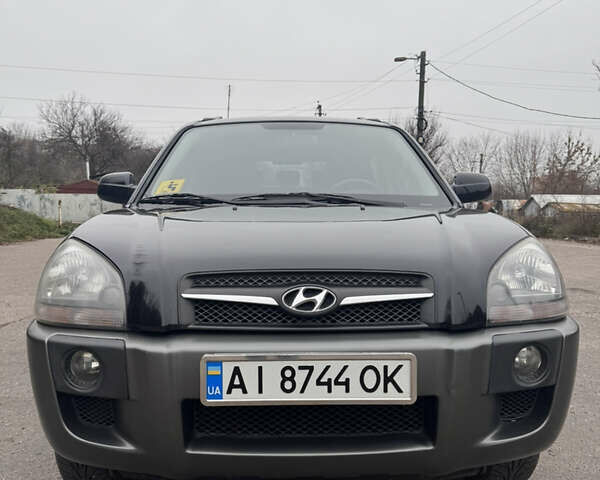 Черный Хендай Туксон, объемом двигателя 1.98 л и пробегом 120 тыс. км за 8500 $, фото 8 на Automoto.ua