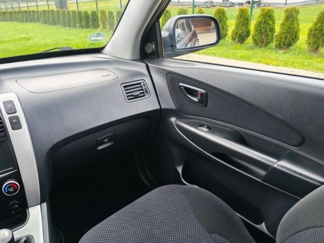 Чорний Хендай Туксон, об'ємом двигуна 1.98 л та пробігом 148 тис. км за 6199 $, фото 11 на Automoto.ua