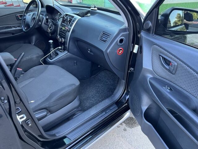 Хендай Туксон 2009 в Кривом Роге на Automoto.ua Черный Хендай Туксон, объемом двигателя 2 л и пробегом 245 тыс. км за 7900 $, фото 7 на Automoto.ua