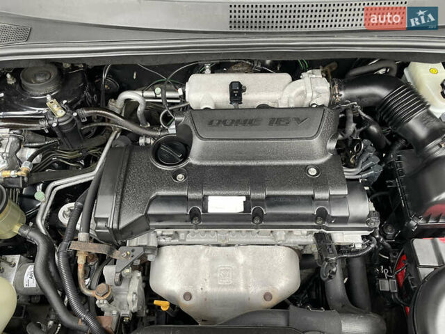 Чорний Хендай Туксон, об'ємом двигуна 2 л та пробігом 200 тис. км за 8450 $, фото 40 на Automoto.ua