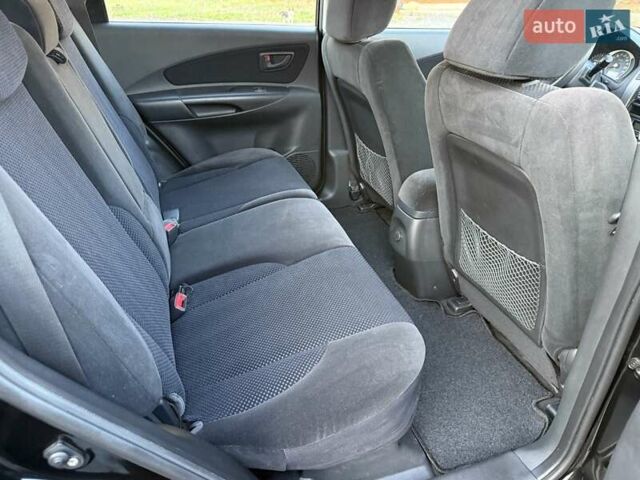 Черный Хендай Туксон, объемом двигателя 2 л и пробегом 110 тыс. км за 8899 $, фото 35 на Automoto.ua