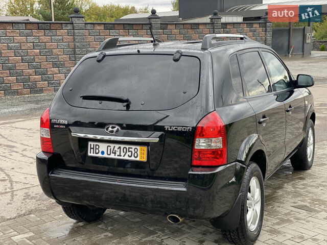 Черный Хендай Туксон, объемом двигателя 2 л и пробегом 191 тыс. км за 7800 $, фото 9 на Automoto.ua