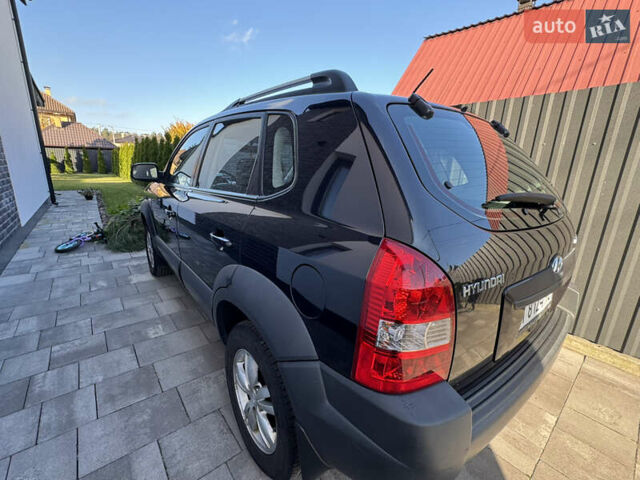 Чорний Хендай Туксон, об'ємом двигуна 1.98 л та пробігом 200 тис. км за 8200 $, фото 3 на Automoto.ua