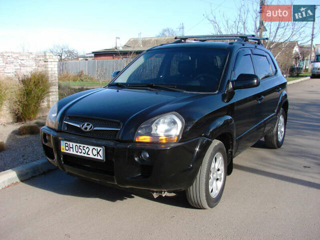 Черный Хендай Туксон, объемом двигателя 2 л и пробегом 162 тыс. км за 8200 $, фото 1 на Automoto.ua