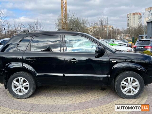 Чорний Хендай Туксон, об'ємом двигуна 2 л та пробігом 246 тис. км за 7999 $, фото 7 на Automoto.ua