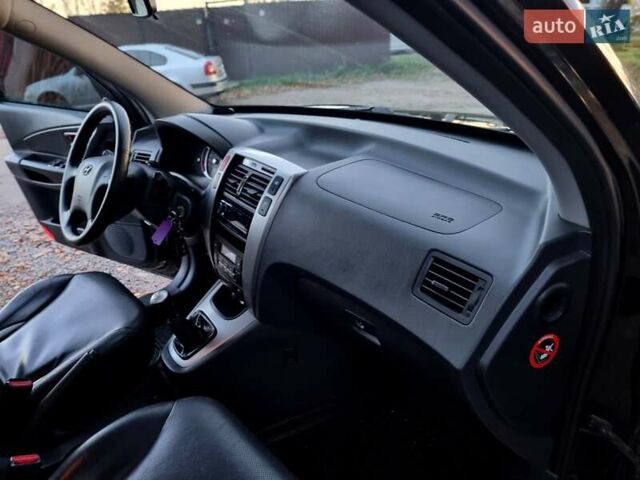 Хендай Туксон 2009 в Виннице на Automoto.ua Черный Хендай Туксон, объемом двигателя 2 л и пробегом 188 тыс. км за 9200 $, фото 43 на Automoto.ua