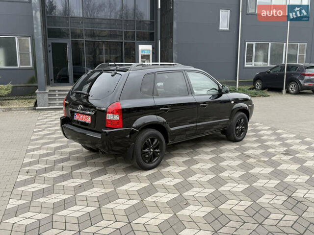 Черный Хендай Туксон, объемом двигателя 2 л и пробегом 191 тыс. км за 8500 $, фото 9 на Automoto.ua