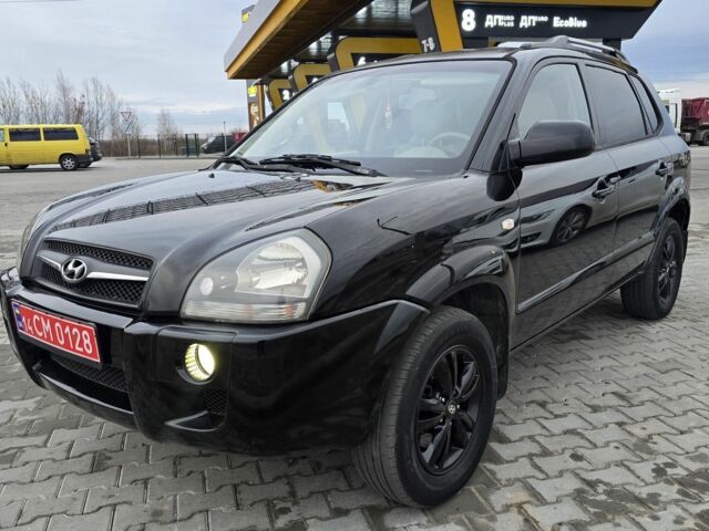 Черный Хендай Туксон, объемом двигателя 2 л и пробегом 198 тыс. км за 7999 $, фото 5 на Automoto.ua