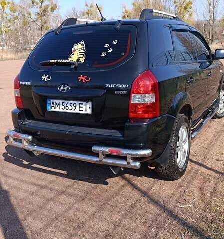 Черный Хендай Туксон, объемом двигателя 2 л и пробегом 226 тыс. км за 8700 $, фото 25 на Automoto.ua