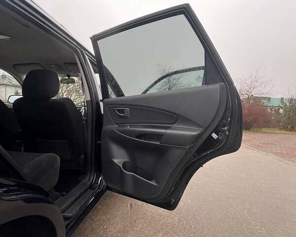 Черный Хендай Туксон, объемом двигателя 2 л и пробегом 128 тыс. км за 9200 $, фото 10 на Automoto.ua