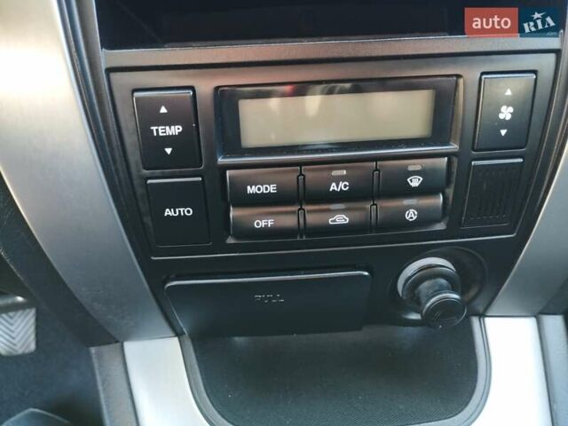 Черный Хендай Туксон, объемом двигателя 1.99 л и пробегом 159 тыс. км за 9700 $, фото 19 на Automoto.ua