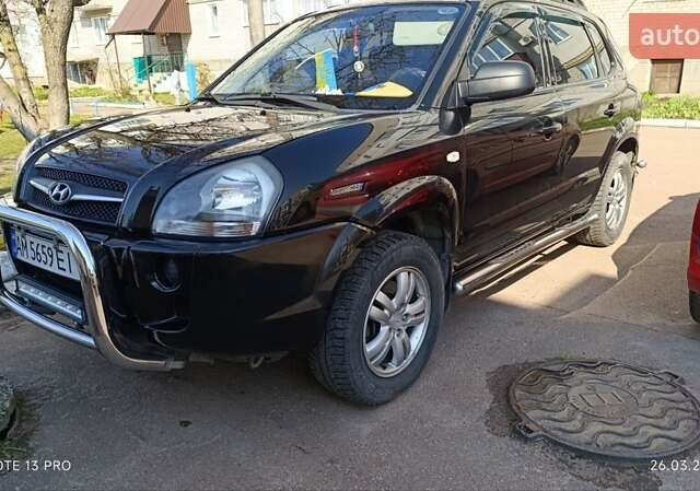 Черный Хендай Туксон, объемом двигателя 2 л и пробегом 226 тыс. км за 8700 $, фото 16 на Automoto.ua