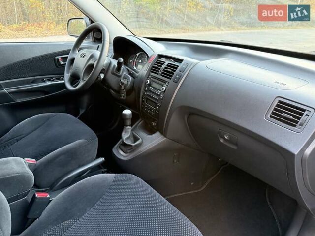 Черный Хендай Туксон, объемом двигателя 2 л и пробегом 148 тыс. км за 8700 $, фото 23 на Automoto.ua