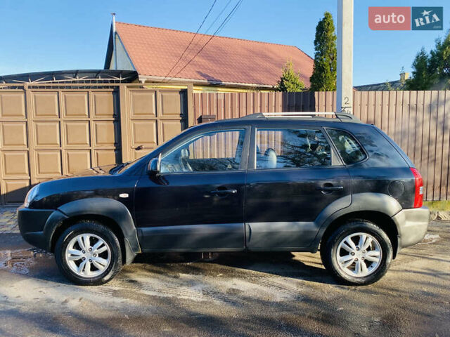 Черный Хендай Туксон, объемом двигателя 1.99 л и пробегом 95 тыс. км за 8700 $, фото 2 на Automoto.ua