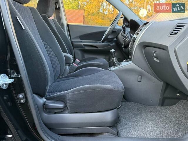 Черный Хендай Туксон, объемом двигателя 2 л и пробегом 110 тыс. км за 8899 $, фото 39 на Automoto.ua