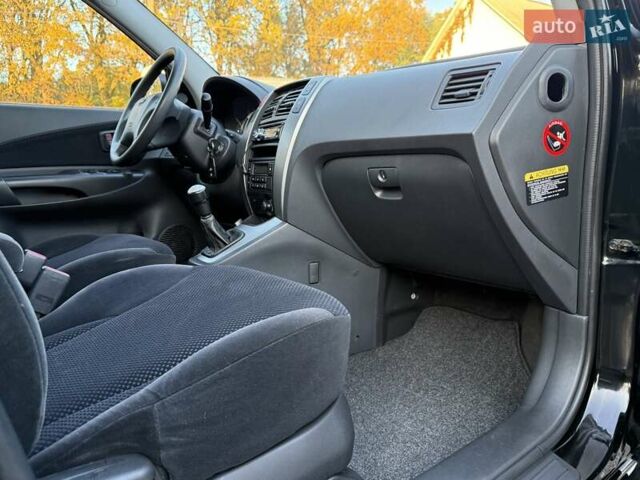 Черный Хендай Туксон, объемом двигателя 2 л и пробегом 110 тыс. км за 8899 $, фото 38 на Automoto.ua
