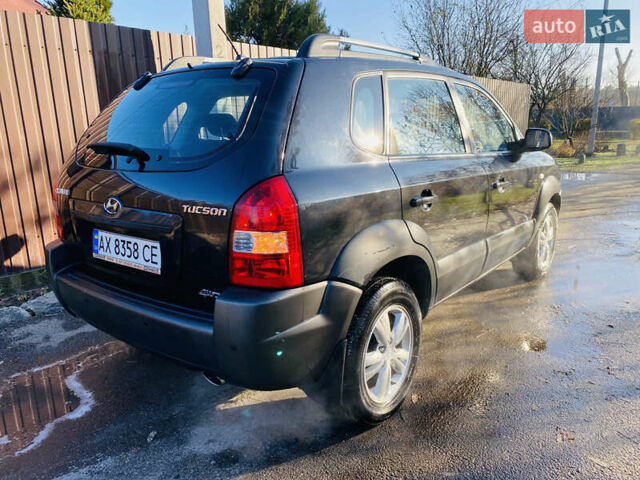 Черный Хендай Туксон, объемом двигателя 1.99 л и пробегом 95 тыс. км за 8500 $, фото 20 на Automoto.ua
