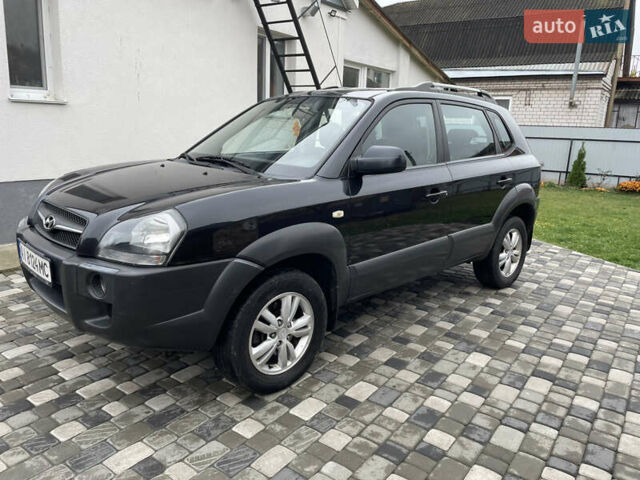Чорний Хендай Туксон, об'ємом двигуна 2 л та пробігом 200 тис. км за 8450 $, фото 4 на Automoto.ua