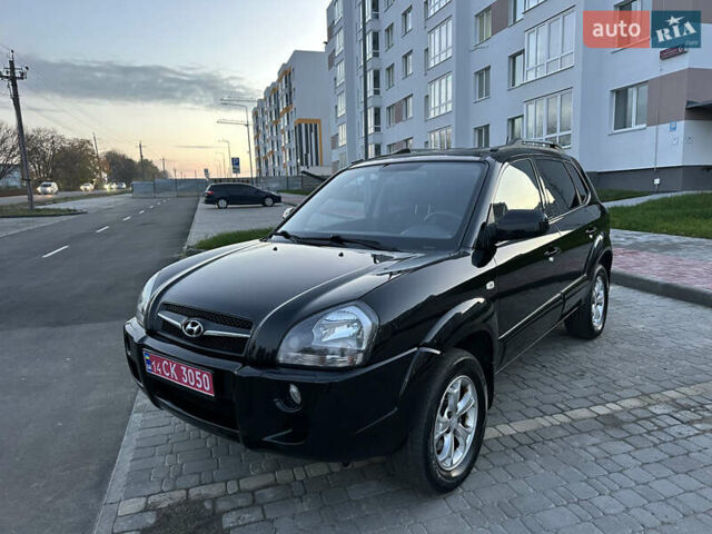 Черный Хендай Туксон, объемом двигателя 2 л и пробегом 131 тыс. км за 9199 $, фото 1 на Automoto.ua