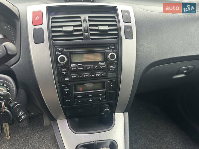 Чорний Хендай Туксон, об'ємом двигуна 1.98 л та пробігом 230 тис. км за 8700 $, фото 18 на Automoto.ua