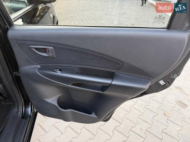 Черный Хендай Туксон, объемом двигателя 2 л и пробегом 148 тыс. км за 8700 $, фото 21 на Automoto.ua