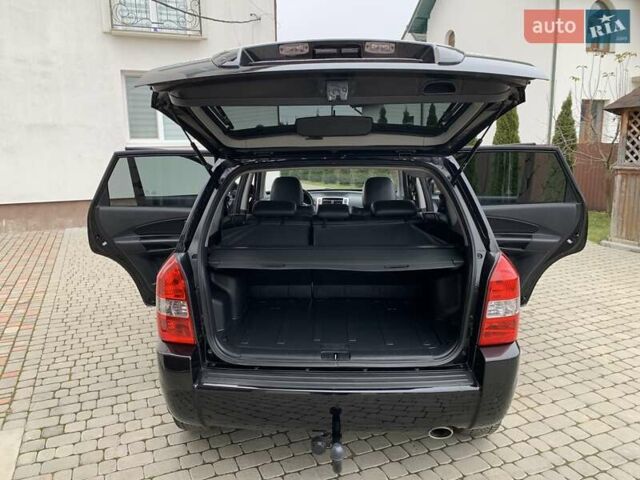 Черный Хендай Туксон, объемом двигателя 2 л и пробегом 114 тыс. км за 8850 $, фото 60 на Automoto.ua