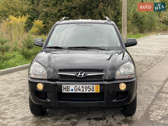 Черный Хендай Туксон, объемом двигателя 2 л и пробегом 191 тыс. км за 7800 $, фото 1 на Automoto.ua