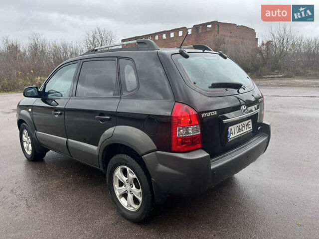 Хендай Туксон 2009 в Шостке на Automoto.ua Черный Хендай Туксон, объемом двигателя 1.98 л и пробегом 204 тыс. км за 9299 $, фото 13 на Automoto.ua
