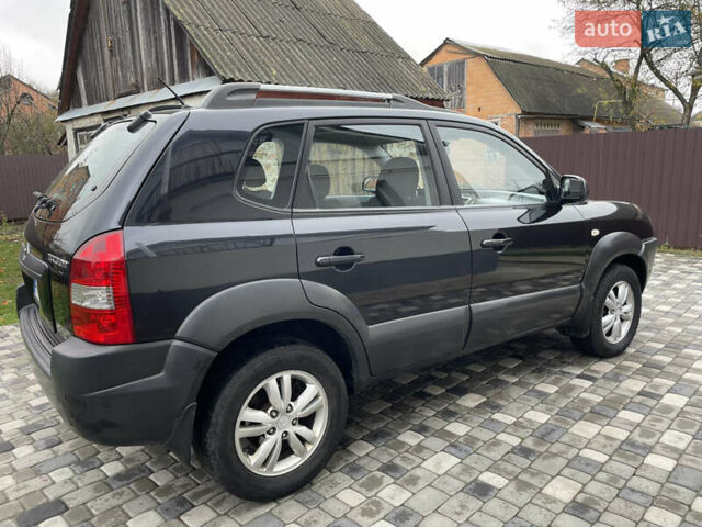 Чорний Хендай Туксон, об'ємом двигуна 2 л та пробігом 200 тис. км за 8450 $, фото 12 на Automoto.ua