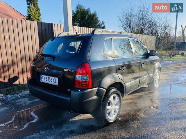 Черный Хендай Туксон, объемом двигателя 1.99 л и пробегом 95 тыс. км за 8500 $, фото 25 на Automoto.ua