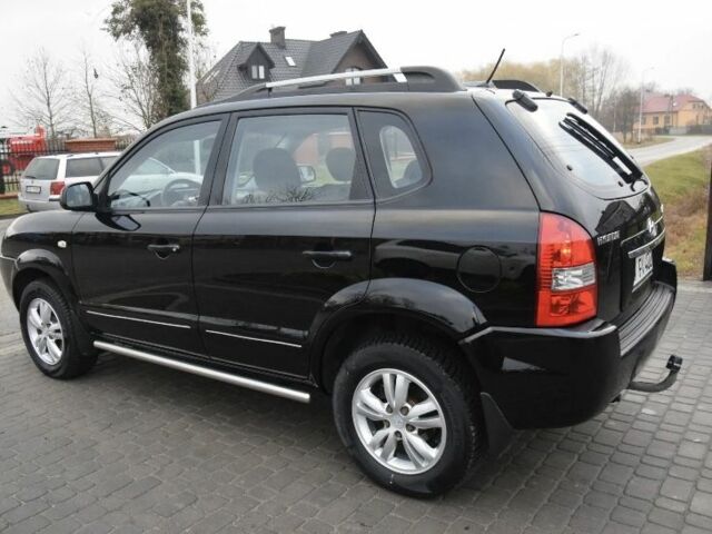 Черный Хендай Туксон, объемом двигателя 2 л и пробегом 184 тыс. км за 5480 $, фото 8 на Automoto.ua