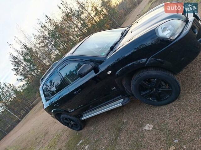 Чорний Хендай Туксон, об'ємом двигуна 1.98 л та пробігом 172 тис. км за 9500 $, фото 2 на Automoto.ua