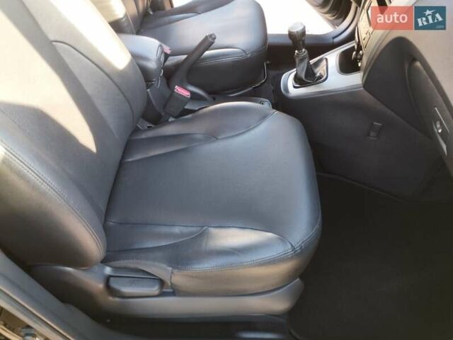 Черный Хендай Туксон, объемом двигателя 1.99 л и пробегом 159 тыс. км за 9700 $, фото 15 на Automoto.ua