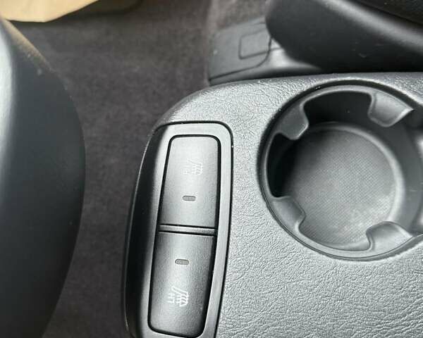 Черный Хендай Туксон, объемом двигателя 2 л и пробегом 237 тыс. км за 8350 $, фото 28 на Automoto.ua