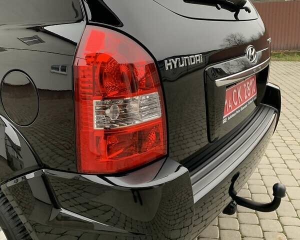 Черный Хендай Туксон, объемом двигателя 2 л и пробегом 114 тыс. км за 8850 $, фото 21 на Automoto.ua