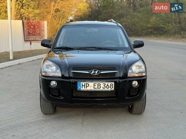 Черный Хендай Туксон, объемом двигателя 2 л и пробегом 148 тыс. км за 8700 $, фото 1 на Automoto.ua