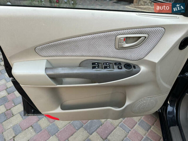 Хендай Туксон 2009 в Калуше на Automoto.ua Черный Хендай Туксон, объемом двигателя 1.98 л и пробегом 198 тыс. км за 7500 $, фото 25 на Automoto.ua