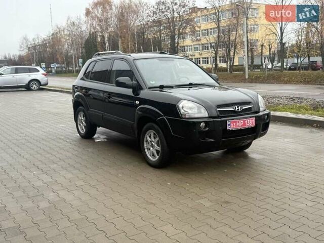 Черный Хендай Туксон, объемом двигателя 2 л и пробегом 237 тыс. км за 8350 $, фото 18 на Automoto.ua